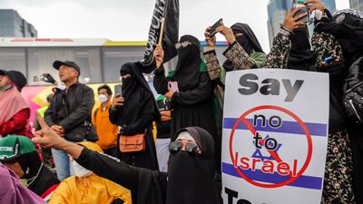 Protesters shout slogans during a protest against Israel's participation in the tournament, in Jakarta in Indonesia. EPA