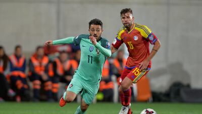 Portugal midfielder Bernardo Silva vies for the ball with Andorra’s Moises San Nicolas. Vincent West / Reuters