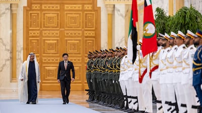 President Sheikh Mohamed and Lawrence Wong, Prime Minister of Singapore, inspect a guard of honour as part of an official reception in Abu Dhabi. Photo: UAE Presidential Court