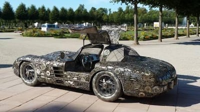 It took three men seven months to build the SLR from scrap. Courtesy of SWNS
