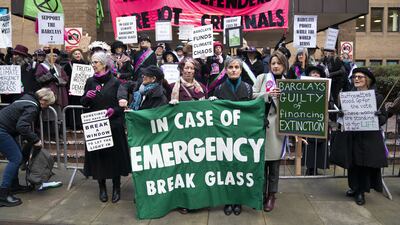 Climate protesters outside Southwark Crown Court, London. PA