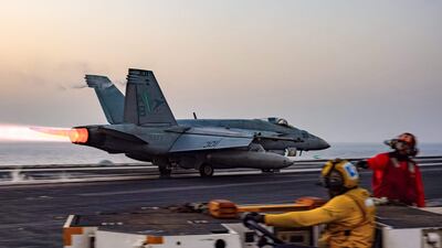 An F/A-18 Super Hornet attack fighter jet takes off from the USS Harry S. Truman aircraft carrier. AFP