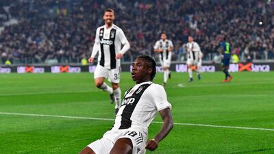 Moise Kean celebrates after scoring against Udinese. ANSA via AP