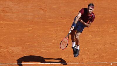 Roger Federer serves the ball to Guillermo Garcia-Lopez during their Monte Carlo Masters second round match on Tuesday. Valery Hache / AFP / April 12, 2016