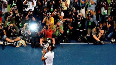 Marin Cilic, of Croatia, took centre stage in the limelight at the Flushing Meadows on Monday night. Mike Groll / AP Photo