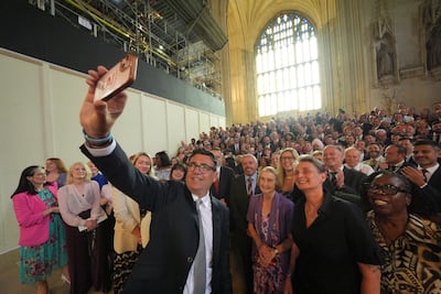 Newly minted MP Andy Burnham, seen with his colleagues in UK Parliament, is an attention-grabbing politician in an attention-poor world. PA