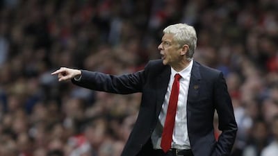 Arsenal manager Arsene Wenger gestures during the Premier League match against Tottenham Hotspur at Emirates Stadium in London on on September 27, 2014. Ian Kington / AFP