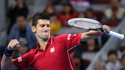 Novak Djokovic celebrates winning the ATP China Open final over Tomas Berdych on Sunday in Beijing. Feng Li / Getty Images / October 5, 2014