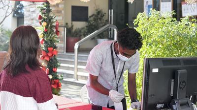 Registration checks for Christmas mass at the chuch.