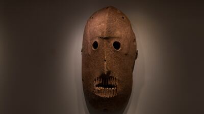 A Neolithic mask from American billionaire Michael Steinhardt's collection is displayed at the Israel Museum in Jerusalem. AP