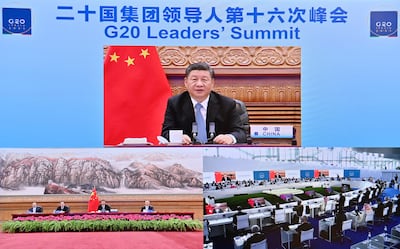 In this photo released by China's Xinhua News Agency, Chinese President Xi Jinping speaks via video link to leaders at the G20 Summit from Beijing. AP