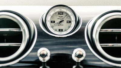 A Breitling mother-of-pearl clock takes the centre of the dashboard. Courtesy Bentley