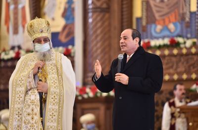 President Abdel Fattah El Sisi speaking alongside Pope Tawadros II, spiritual leader of Egypt's Coptic Orthodox Christians, during Christmas Mass on January 6. AFP