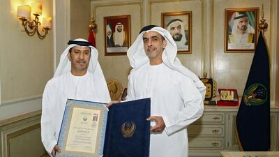 Lt Gen Sheikh Saif bin Zayed, Deputy Prime Minister and Minister of the Interior awards the First Class Rescue Medal to Emirati Saeed Al Muhairi, at the ministry’s headquarters. Wam