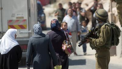Palestinians are now being banned from buses used by Israeli settlers, so why isn't the Palestinian Authority leading the cries of outrage? Photo: Menahem Kahana / AFP
