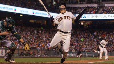 Gregor Blanco of the San Francisco Giants was hit by a pitch from Marc Rzepczynski of the Oakland Athletics during the sixth inning at AT&T Park on June 28, 2016, in San Francisco, California. Jason O. Watson / Getty Images / AFP