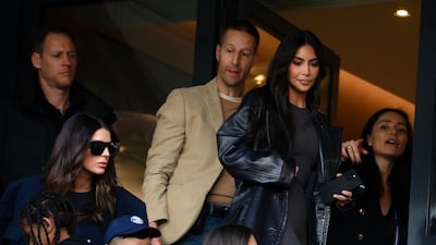 US socialite Kim Kardashian (R) attends the French L1 football match between Paris Saint-Germain (PSG) and Stade Rennais FC at The Parc des Princes Stadium in Paris on March 19, 2023. (Photo by FRANCK FIFE / AFP)