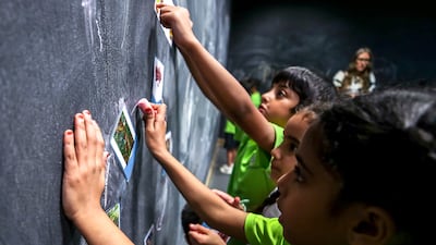 The role of a teacher will still be in demand amid the rise of AI as it requires human interaction, creativity and critical thinking. Victor Besa / The National