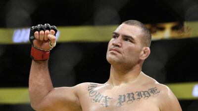 Cain Velasquez celebrates after defeating Travis Browne during their heavyweight bout at UFC 200, Saturday, July 9, 2016, in Las Vegas. John Locher / AP Photo