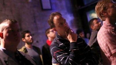 Brooklynites watch as President Obama and the Republicans’ Mitt Romney square off in their highly anticipated first debate.