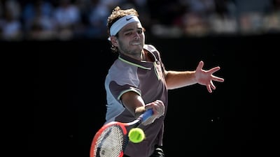 Taylor Fritz fought well against Novak Djokovic in their Australian Open quarter-final. EPA