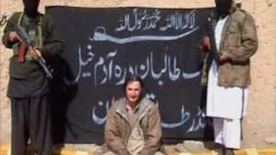 A frame grab from a video showing Piotr Stanczak at an unknown location after he was abducted.