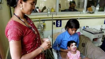 A reader says Indian health authorities need to do more to eradicate encephalitis. Biswajeet Banerjee / AP Photo