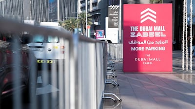 Signs directing crowds to Downtown Dubai NYE’s celebrations. Reem Mohammed / The National