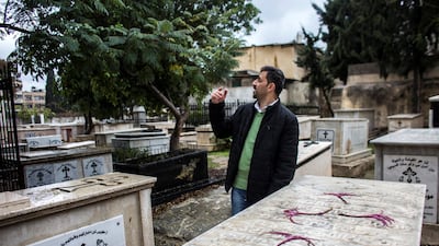 Greek Orthodox Christian Palestinian Kamal Ayyad in the cemetery at the Church of Saint Porphyrius.