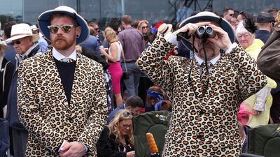Spectators can be seen before the running of the 157th version of the A$6.2 million ($4.77 million) Melbourne Cup at Flemington racecourse. David Crosling / Reuters