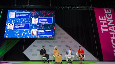 Philipp Rosler, former vice chancellor of Germany; Dr Narwan Al Zahrouni, chief executive of the Dubai Blockchain Centre; Ralf Glabischnig, founder and board member of CV Labs; and Kristina Lucrezia Corner, editor-in-chief of Cointelegraph, at Gitex Global in Dubai on Monday. Leslie Pableo / The National