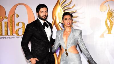 Bollywood actors Ali Fazal (L) and Radhika Apte arrive for the IIFA Rocks of the 20th International Indian Film Academy (IIFA) Awards at NSCI Dome in Mumbai on September 16, 2019.