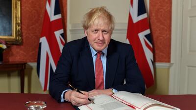 UK Prime Minister Boris Johnson signs the Brexit Withdrawal Agreement.
