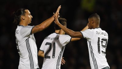 Marcus Rashford of Manchester United celebrates scoring his side’s third goal with Zlatan Ibrahimovic. Laurence Griffiths / Getty Images