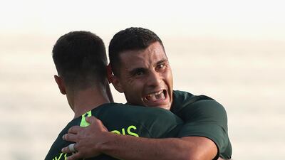 Chris Ikonomidis and Andrew Nabbout of Australia celebrates their second goal during the international friendly match against Oman at Maktoum Bin Rashid Al Maktoum Stadium in Dubai on Sunday. Australia won the match 5-0 as part of their 2019 Asian Cup preparations. The tournament is being held in the UAE from January 5-February 1. Getty Images