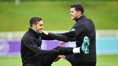 Harry Winks, left, and Michael Keane. Getty