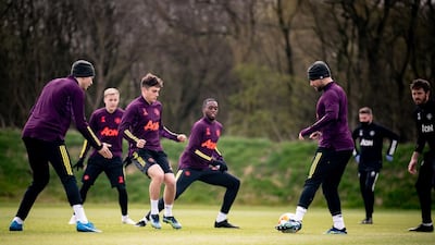 Victor Lindelof, Donny van de Beek, Daniel James, Aaron Wan-Bissaka, and Luke Shaw of Manchester United during a training session at Aon Training Complex on the eve of their Europa League quarter-final second leg against Granada. Getty