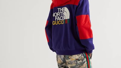 A hooded top, tracksuit bottoms, and teddy fleece slides.