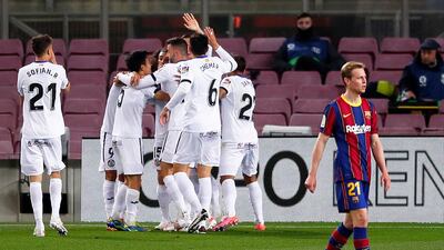 Players of Getafe celebrate their first goal after Clement Lenglet of Barcelona scored an own goal. Getty