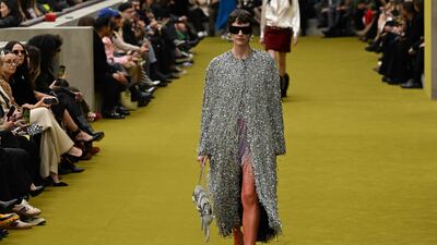 A coat made of strips of metal beading at Gucci. AFP