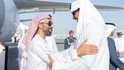 Sheikh Tahnoun bin Zayed, National Security Adviser and Deputy Ruler of Abu Dhabi, speaks to Sheikh Tamim on arrival in Doha