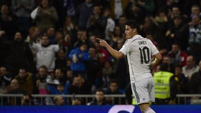Real Madrid's James Rodriguez celebrates after scoring in Madrid's 5-0 Copa del Rey second leg victory on Tuesday night at the Santiago Bernabeu. Pierre-Philippe Marcou / AFP / December 2, 2014