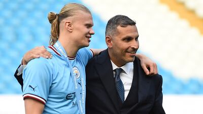 Manchester City striker Erling Haaland and the club's chairman Khaldoon Al Mubarak. EPA