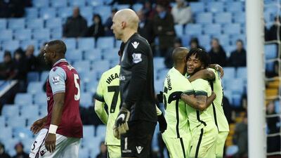 Raheem Sterling celebrates with Manchester City teammates after his goal to make it 4-0 against Aston Villa on Saturday. Andrew Boyers / Action Images / Reuters