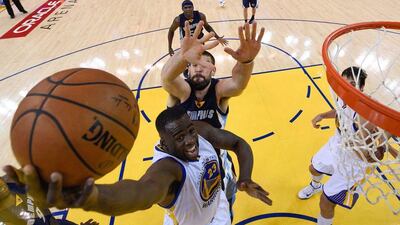 Golden State Warriors forward Draymond Green goes up for a shot against the Memphis Grizzlies on Sunday night in their NBA play-offs second round Game 1 win. John G Mablango / EPA / May 3, 2015