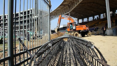 Workers at the National Stadium in Karachi. EPA