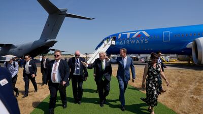 Britain's Prime Minister Boris Johnson tours Farnborough, a vital marketplace for the country's aviation industry. AP
