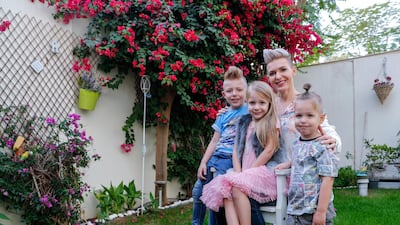 Svetia Deshais, a financial planner based in Abu Dhabi, wants her children to value money. Victor Besa / The National