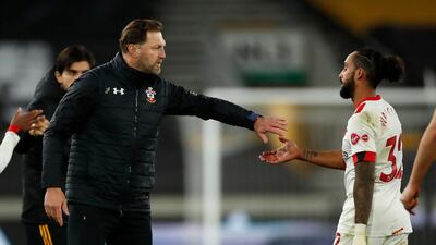 Southampton manager Ralph Hasenhuttl congratulates Theo Walcott after the Premier League match at Molineux. PA