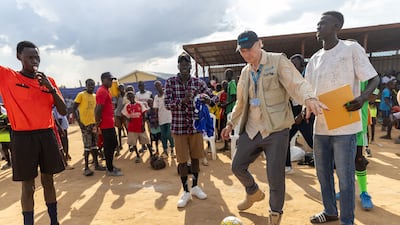Hollywood actor Liam Neeson, as Unicef goodwill ambassador, plays football in Juba, South Sudan, where he said children should not have to ‘fend for themselves’. PA